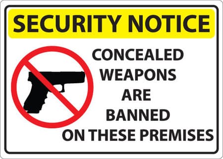Security Notice, Concealed Weapons Are Banned On These Premises