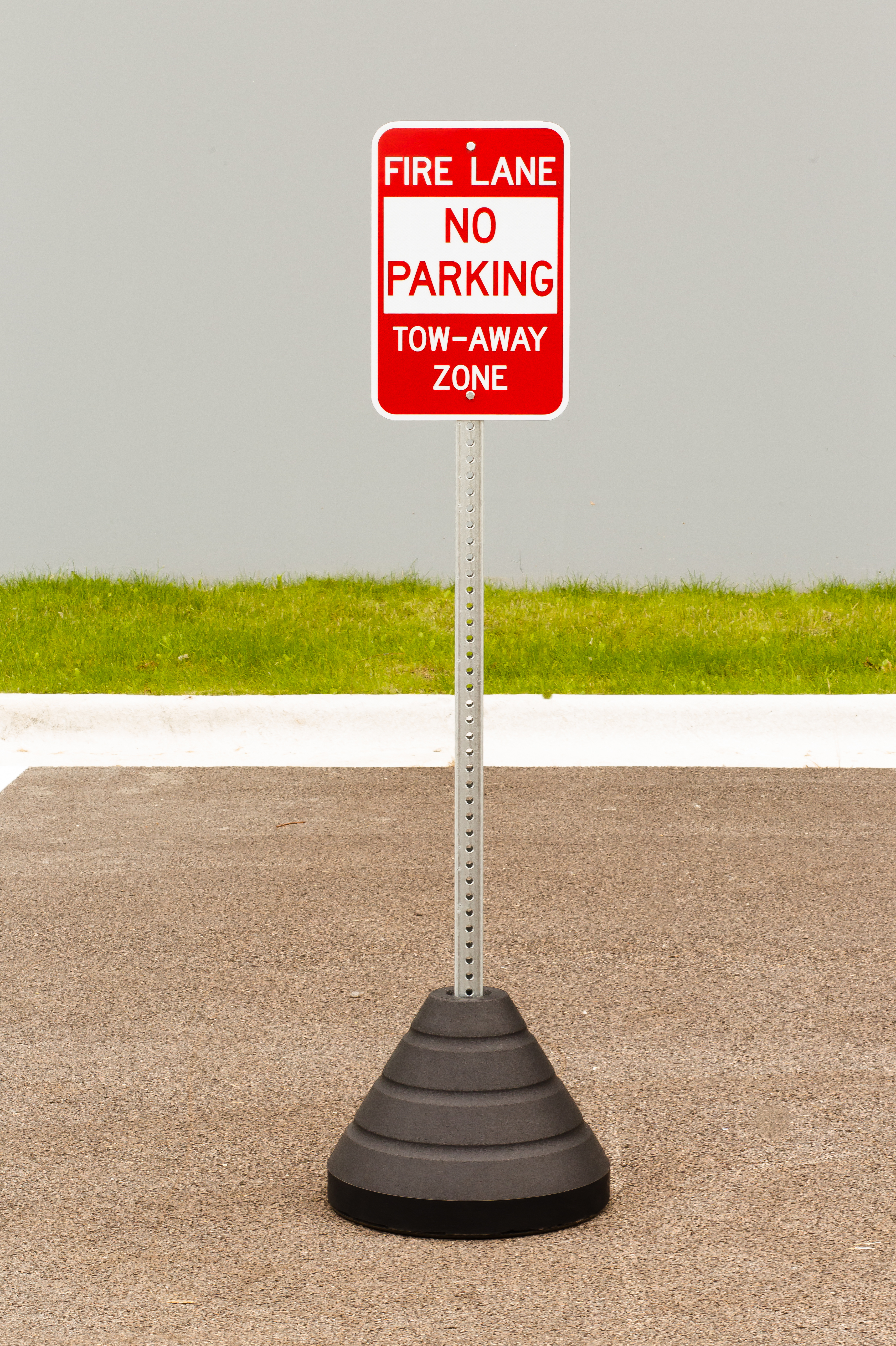 ZING Eco Parking Sign w/Mounting Post and Base, Fire Lane No Parking, 18Hx12W, Engineer Grade Prismatic, Recycled Aluminum